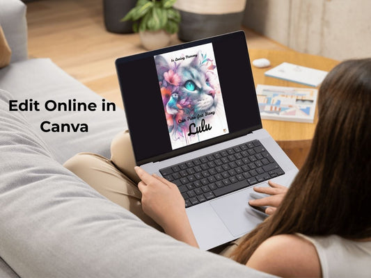 Woman customizing a digital cat memory journal template in Canva on a laptop