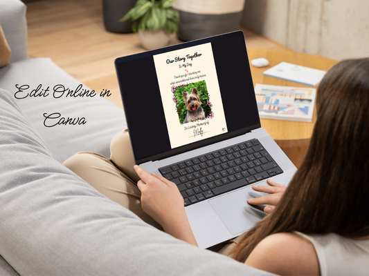 Person holding a tablet with the editable decorated dog memorial journal on screen